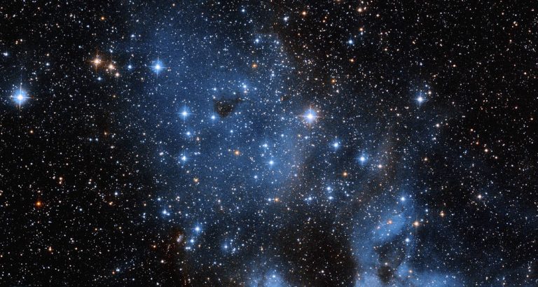 Hubble Spies Emission Nebula-Star Cluster Duo