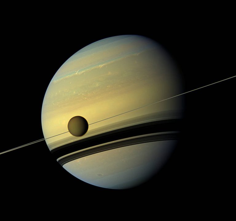 Galactic Giants Titan And Saturn